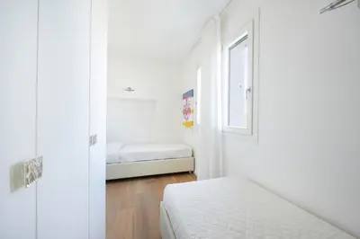 Letto o letti in una camera di Villaggio dei Pellicani Apartments
