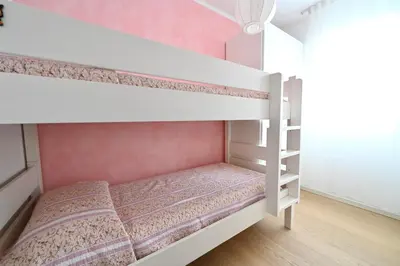 Letto o letti in una camera di Villaggio dei Pellicani Apartments