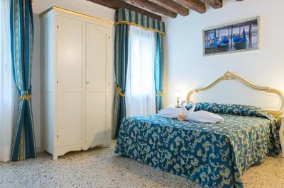 Letto o letti in una camera di Al Mascaron Ridente
