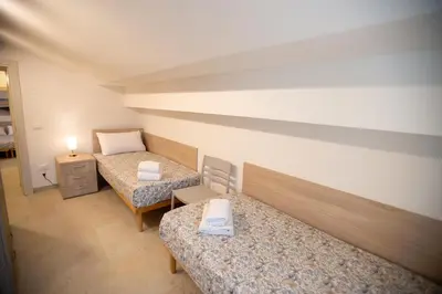 Letto o letti in una camera di Novella Apartment