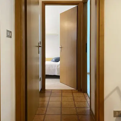 Letto o letti in una camera di [Piazza_Drago_Apartment] Pool, Garden & Free Park