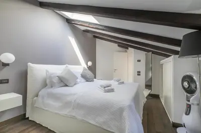 Letto o letti in una camera di Old Town Nest by WelcHome