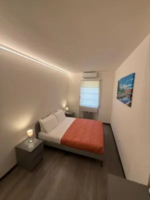 Letto o letti in una camera di AHF apartments
