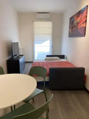 Letto o letti in una camera di AHF apartments