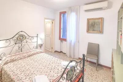 Letto o letti in una camera di Ca' Botera