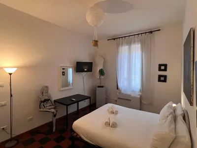 Letto o letti in una camera di Venice, Arte and Cinema,10 min from Venice,Free Parking,WiFi, Via Nervesa 4