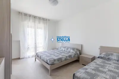 Letto o letti in una camera di Condominio Vicenza