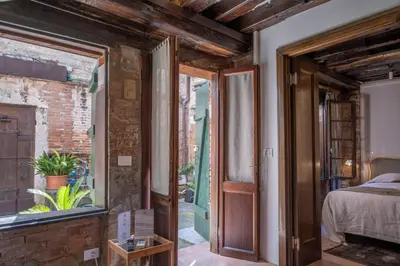 Letto o letti in una camera di Bragozzo ai Miracoli