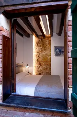Letto o letti in una camera di Bragozzo ai Miracoli
