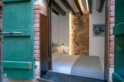 Letto o letti in una camera di Bragozzo ai Miracoli