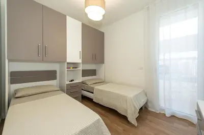 Letto o letti in una camera di Wave Resort - Realnova