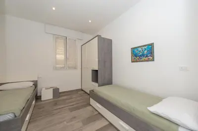 Letto o letti in una camera di Casa Gialla - Realnova