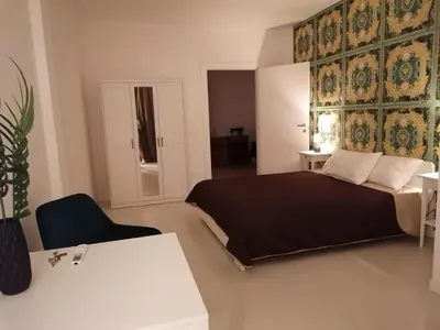 Letto o letti in una camera di Urban Suite