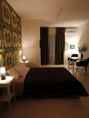 Letto o letti in una camera di Urban Suite