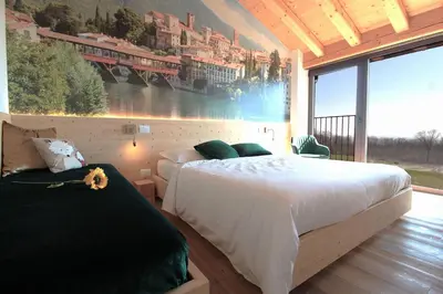 Letto o letti in una camera di Villa Montello Pool, Jacuzzi, Ac, Wifi, Treviso