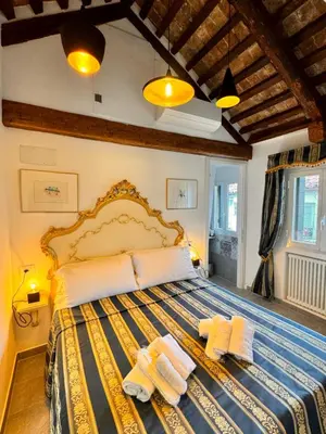 Letto o letti in una camera di Piccolo Paradiso