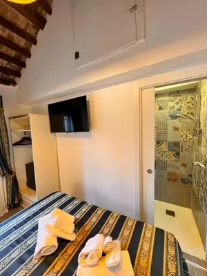Letto o letti in una camera di Piccolo Paradiso
