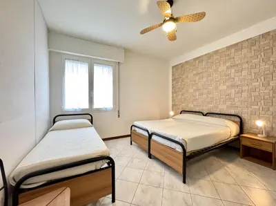 Letto o letti in una camera di Marconi 1T - Carraro Immobiliare - Family Apartments