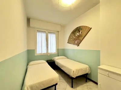 Letto o letti in una camera di Marconi 1T - Carraro Immobiliare - Family Apartments