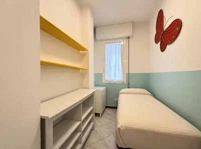 Letto o letti in una camera di Marconi 1T - Carraro Immobiliare - Family Apartments