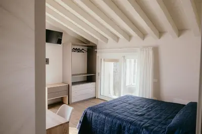 Letto o letti in una camera di Tenuta degli Ulivi