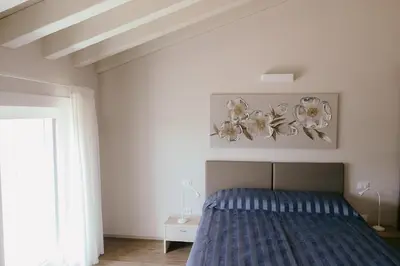 Letto o letti in una camera di Tenuta degli Ulivi