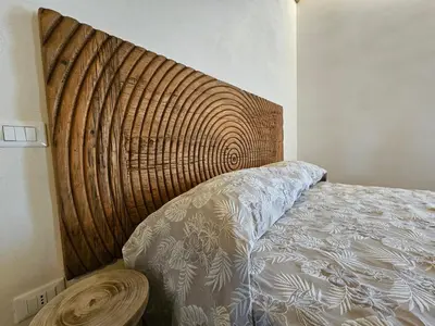 Letto o letti in una camera di Alla Rocca Storica