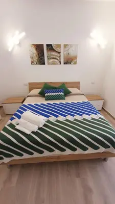 Letto o letti in una camera di Dp House