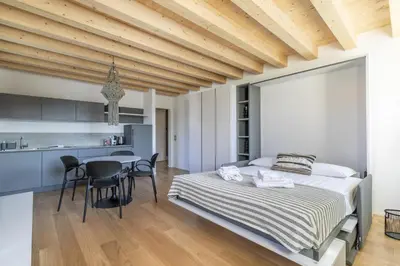 Letto o letti in una camera di Molino 2 by WelcHome
