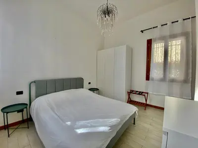 Letto o letti in una camera di Villa Margherita