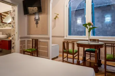Letto o letti in una camera di A Casa Tua 3