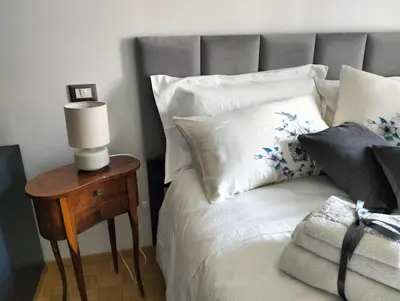 Letto o letti in una camera di Urbino Uno Apt Venezia