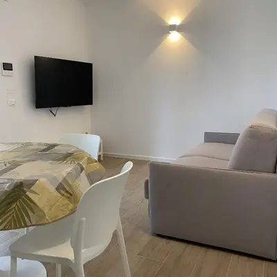 TV o dispositivi per l'intrattenimento presso [Luxury_Apartment_Baia_Blanca] Pool & Free Parking