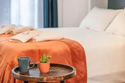 Letto o letti in una camera di Guggenheim Studio