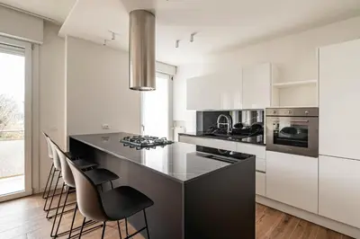 Cucina o angolo cottura di GuestHost - Parco Santa Rita Flat - Padova