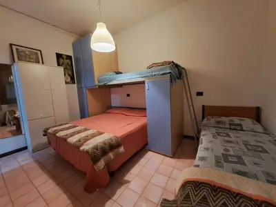 Letto o letti in una camera di Villa Monica - Seasons Real Estate - Lido di Jesolo