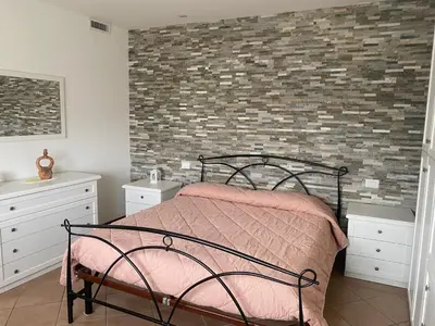 Letto o letti in una camera di Appartamento 'Diva Canova Laguna Veneta'