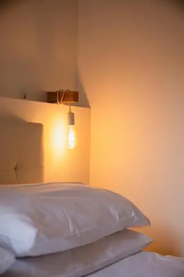 Letto o letti in una camera di Casa Airoldi Incantevole appartamento in laguna