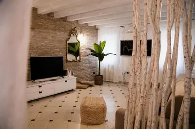 TV o dispositivi per l'intrattenimento presso Casa Airoldi Incantevole appartamento in laguna