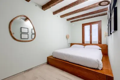 Letto o letti in una camera di La Caorlina - Pied à Terre - Bas-relief