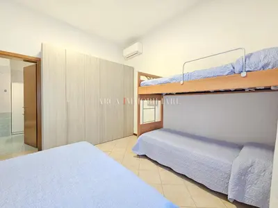 Letto o letti in una camera di Voltacinque Family Apartment