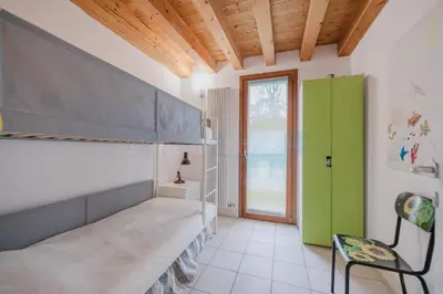 Letto o letti in una camera di Residence Ca Tron Mare