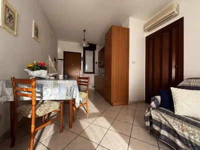 Area soggiorno di Apartment with pool near the beach