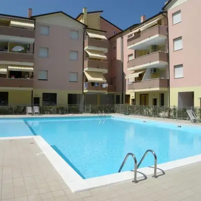 Apartment with pool near the beach