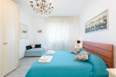 Letto o letti in una camera di Casa Serenissima - with free parking