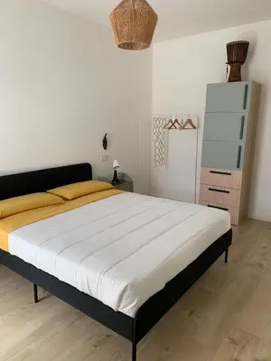 Letto o letti in una camera di Maison Thiago