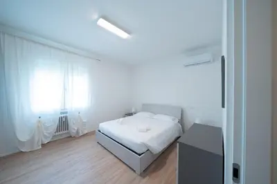 Letto o letti in una camera di Casa Mantegna
