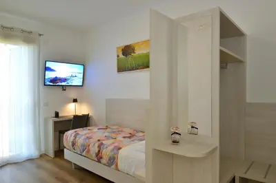Letto o letti in una camera di ALMA Guest House