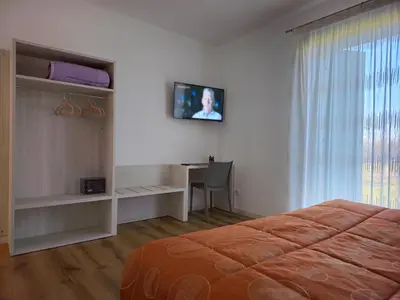 TV o dispositivi per l'intrattenimento presso ALMA Guest House