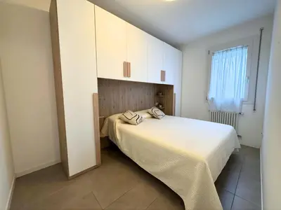 Letto o letti in una camera di Condominio Oderzo - Home Immobiliare